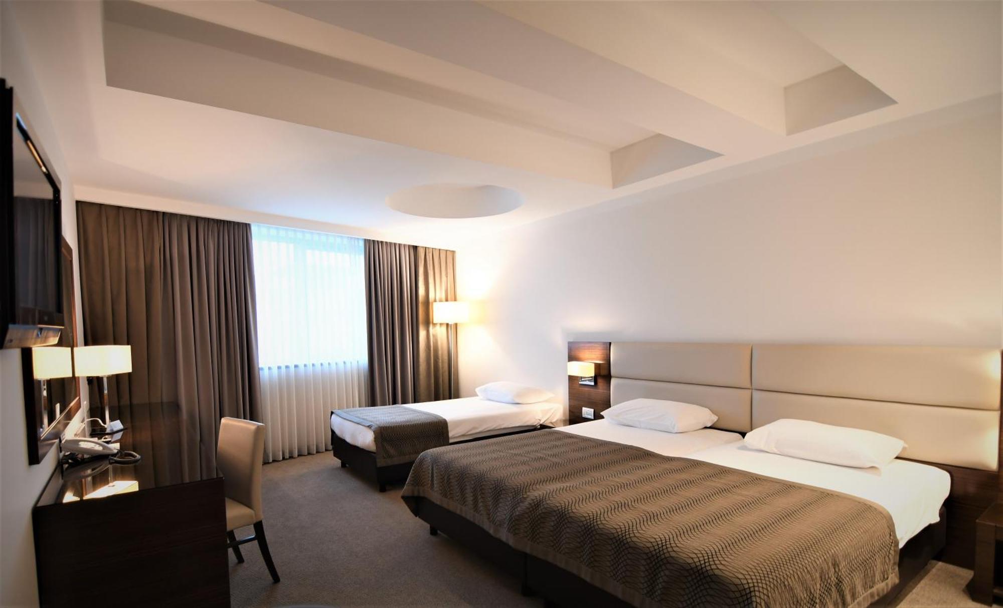 Deluxe Triple Room,1212058291:JPEG