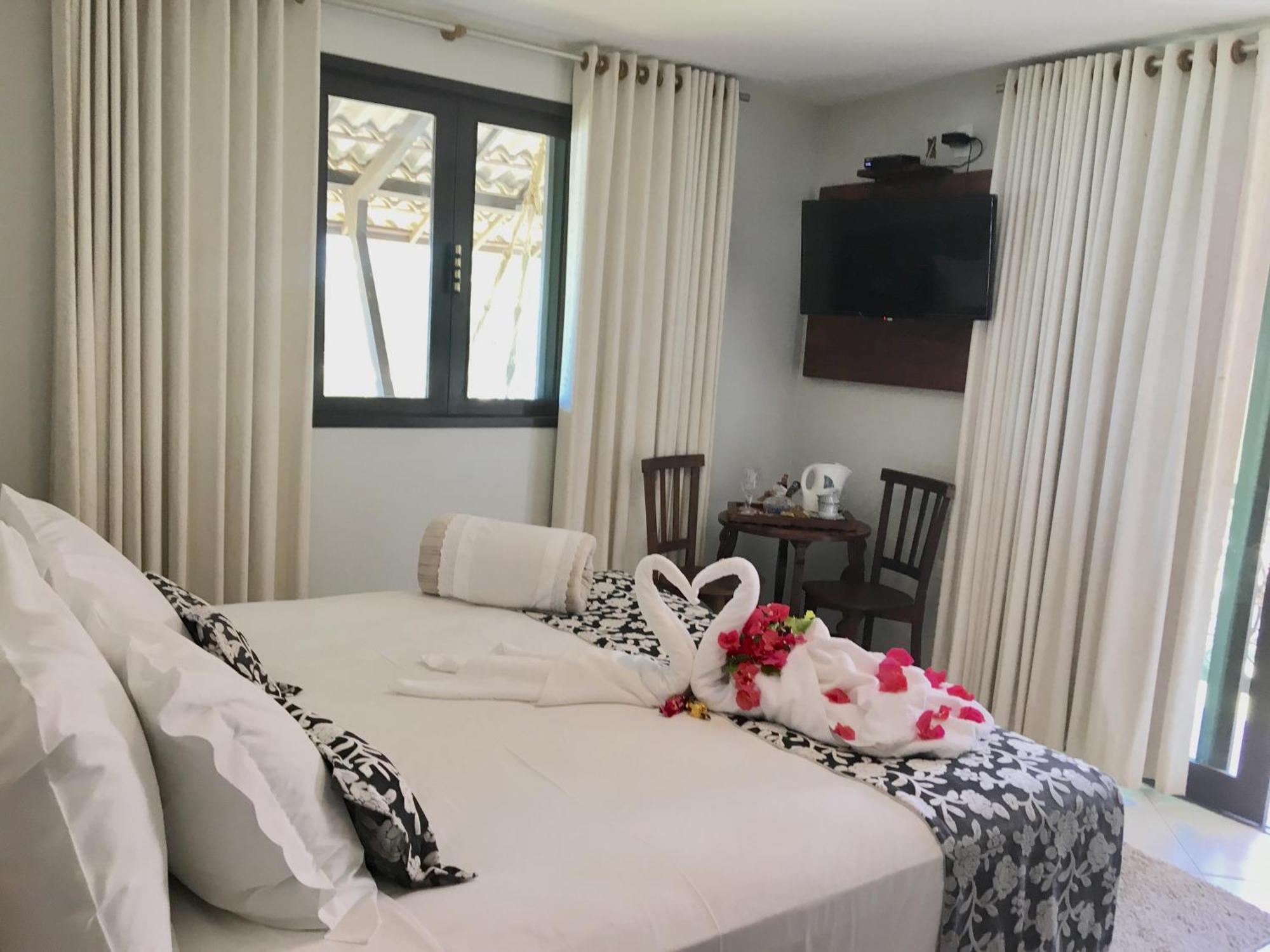 Quarto Duplo Deluxe com Varanda e Vista Mar Lateral